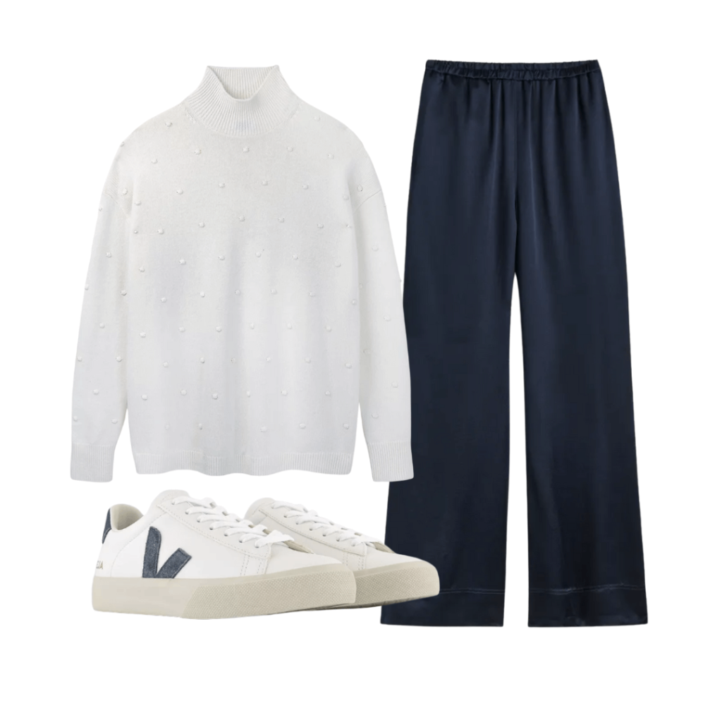 navy silk trousers with a white top and trainers